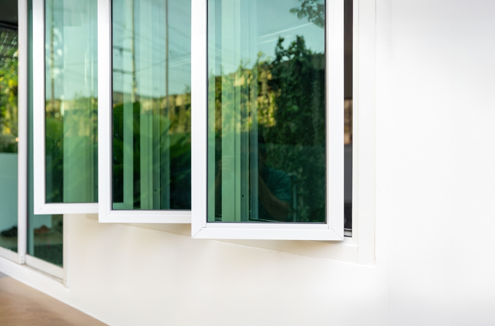 Three,Panel,Aluminium,Casement,Window,Stay,On,White,Wall.